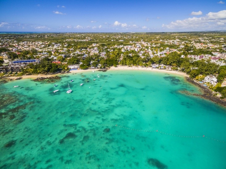 aerial of ocean and Puerto Rico with clear water