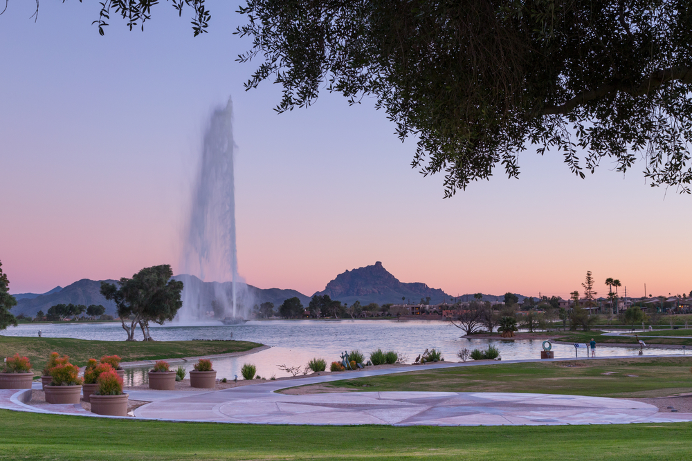 Large fountain in Fountain Hills, AZ during a sunset